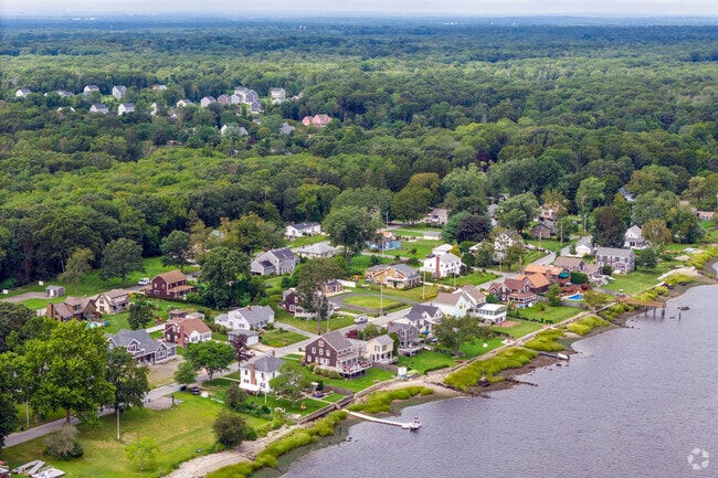 Aerial view of the Touisset neighborhood in Massachusetts showing inland and coastal homes.