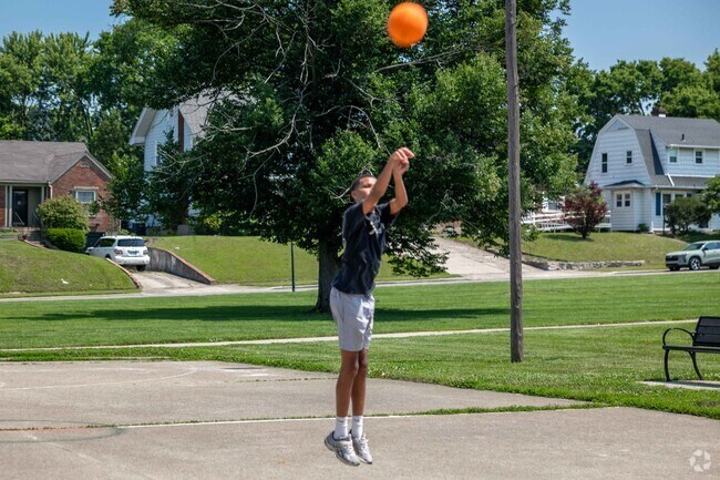 Enjoy a game of basketball at Sunset Park.