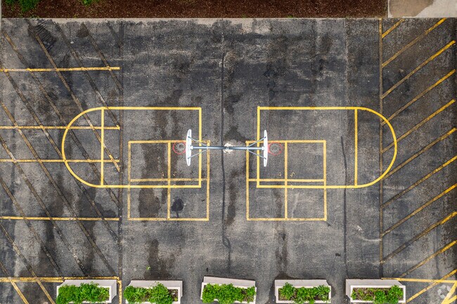 Children at Washington Middle School in Green Bay, WI can play basketball during recess.