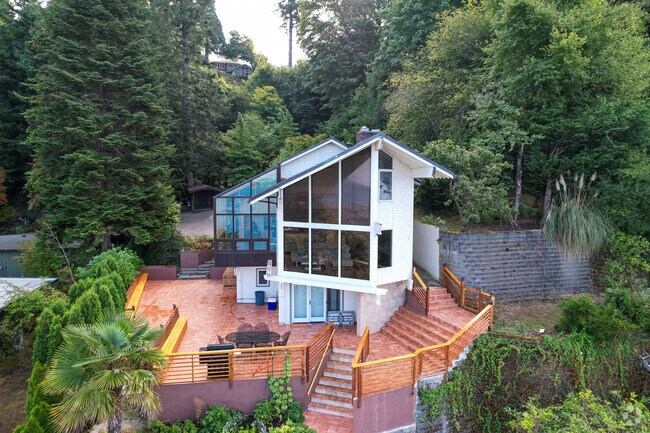 This Beachfront Home has Unusually Large Windows and Design Features.