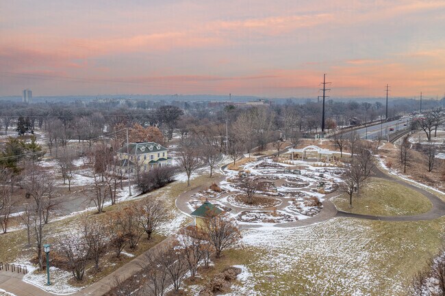 Hiawatha Ave runs underneath Longfellow Gardens and then over Minnehaha Creek.