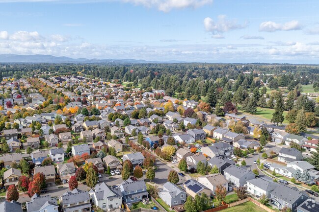 Stunning aerial view of Horizon Pointe: vibrant homes nestled in nature's embrace.