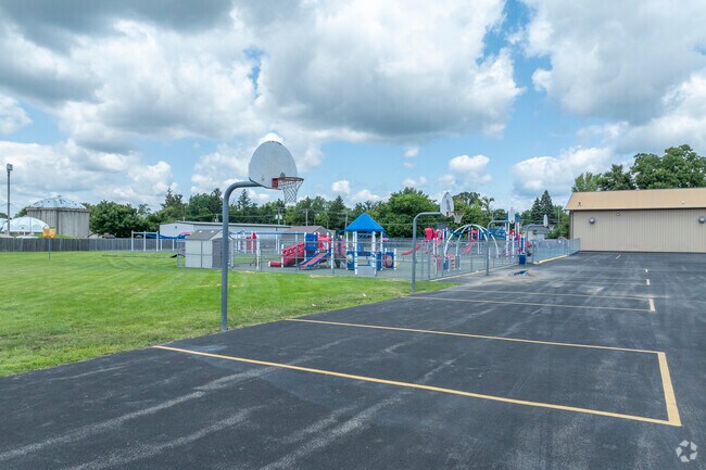 Wauconda Grade School has multiple basketball hoops.