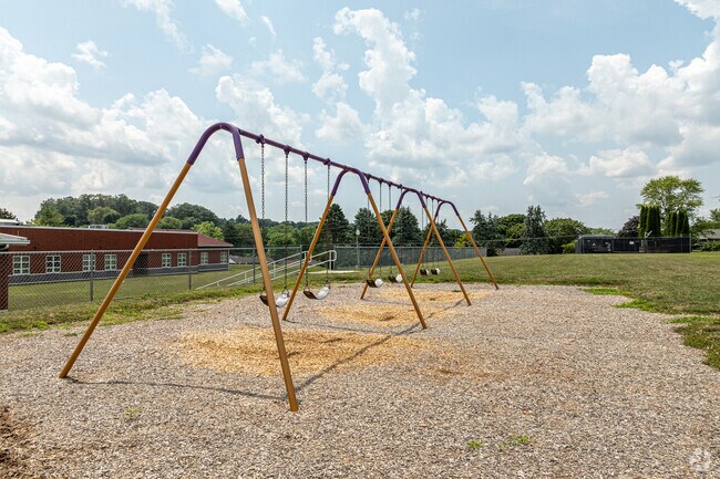 The swings at Manheim Elementary's playground have remained a favorite attraction for years.