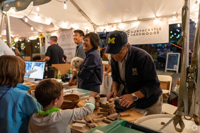 Kids can play Jenga at Harmony Fest in Arlington Heights Central Business District.
