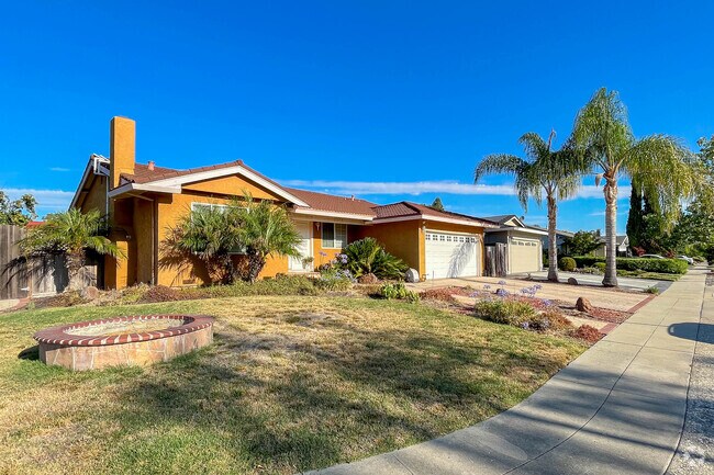 A row of colorful ranch-style houses in Miner, San Jose.