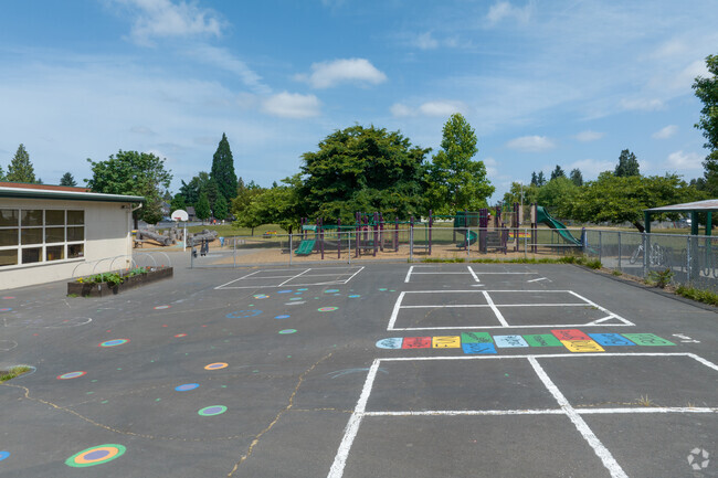 A large playground keeps kids entertained at Lewis Elementary on SE Evergreen St in Portland.