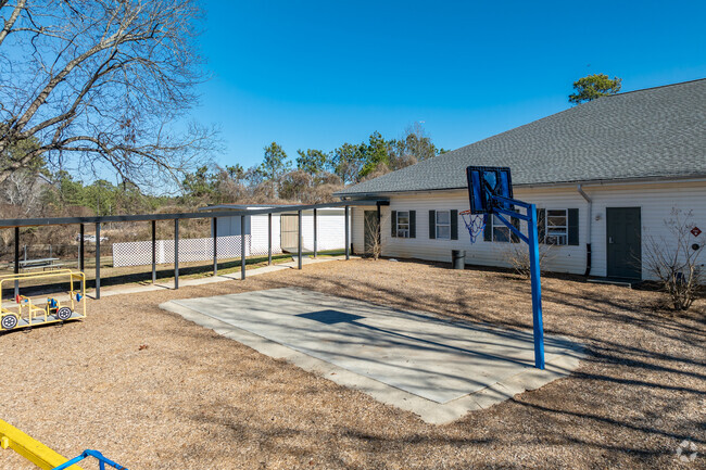 Camelot Christian Academy has a basketball court.