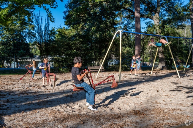 Cheniere Lake Park has a great playground for young kids with mini digging cranes and swings.