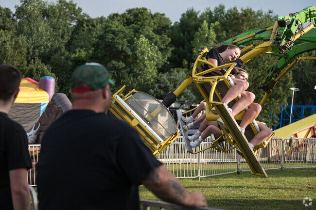 Webster’s annual carnival lights up the town with rides, games, and festive fun for all ages.