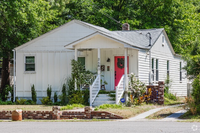 Find cute cottage style homes with shaded porches in Waylyn.