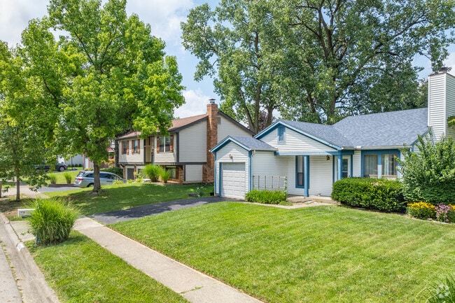 The streets of Worthington Green are lined with mature trees.