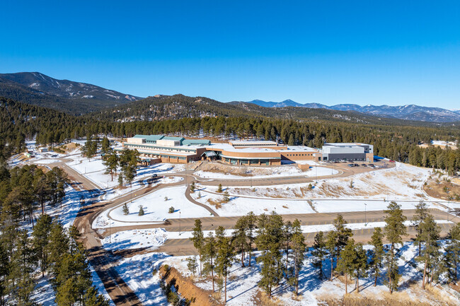 Conifer Senior High School in Conifer is located on a hill near Aspen Park.
