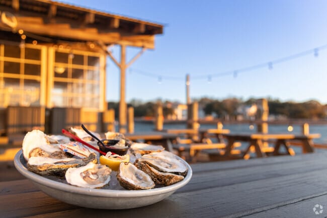Savor fresh raw oysters at Chick's Oyster Bar, a Broad Bay Island a waterfront gem.