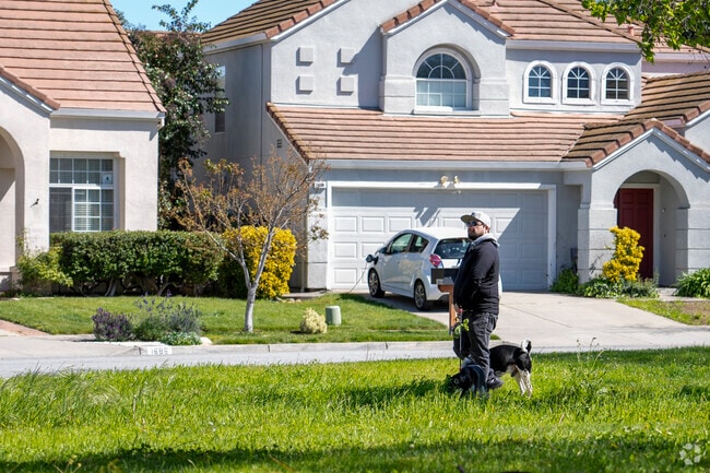 A local walking his dog in the Branham-Kirk neighborhood.