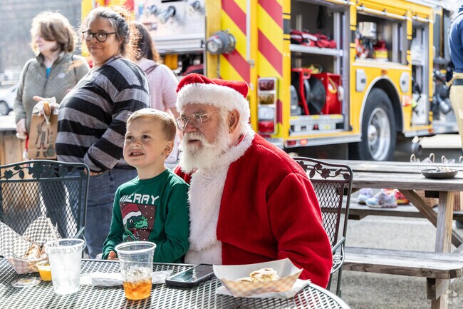 Santa surprises kids at the Kids Christmas Carnival in Washington