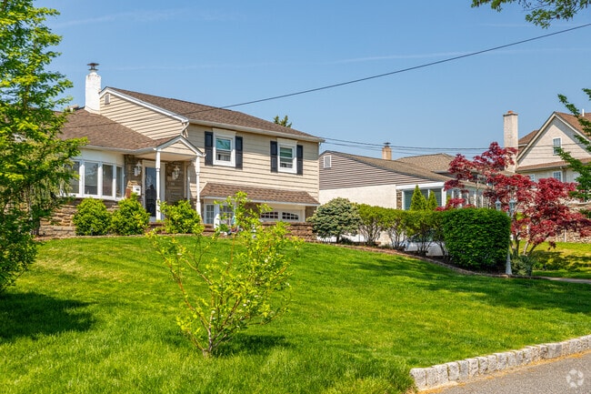 Split level colonials in Northeast Philadelphia have grassy front and back yards for the kids.