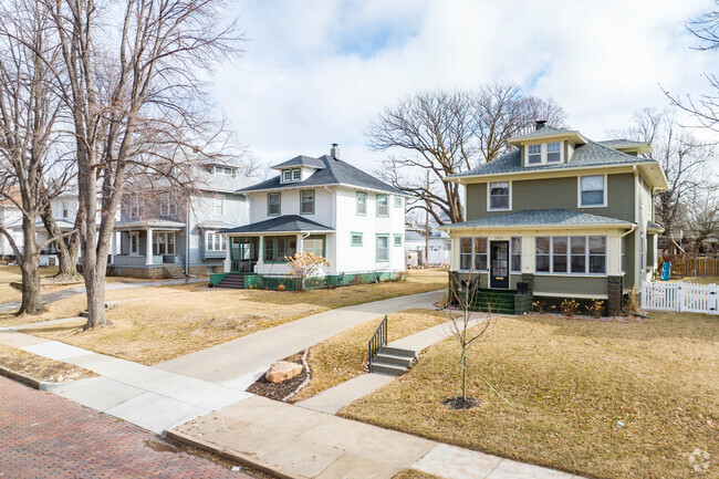 A row of many different American foursquare houses are in this neighborhood.