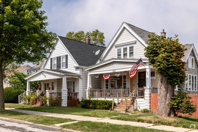 Americana homes with full width front porches are a welcome feature for homes in Morganda