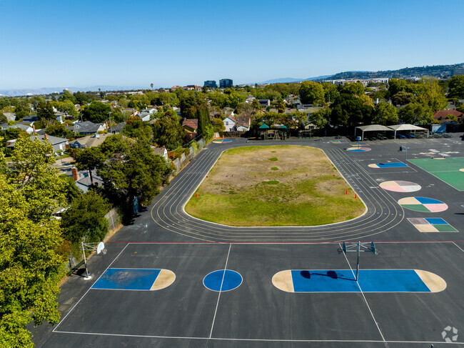 Sunnybrae Elementary School has a track and grass field for sports like soccer and football.