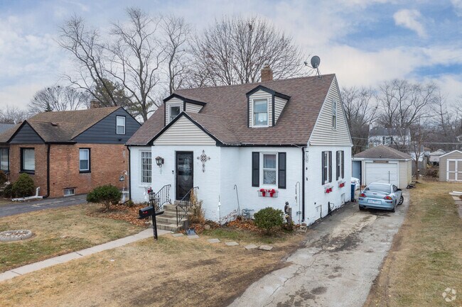 Brick Cape Cod homes add a charming touch to Waukegan Gardens.
