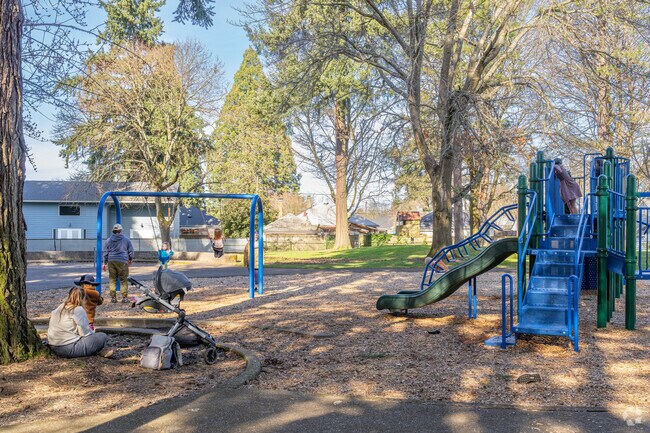 Play on the well shaded playgrounds at McKenna Park in the University Park neighborhood.