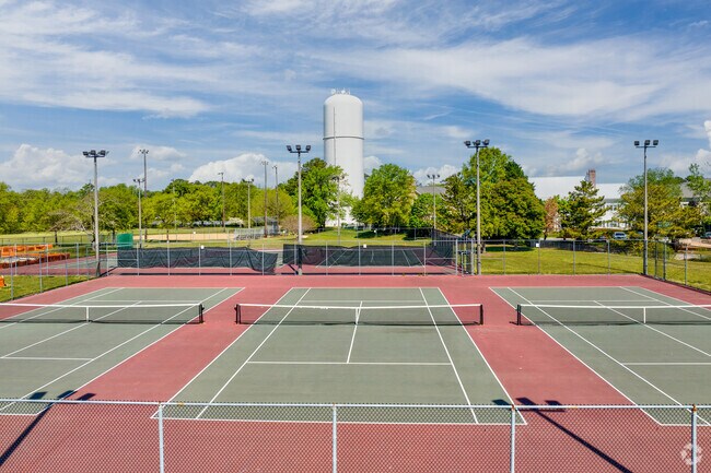 Tennis enthusiasts frequently gather at the well-maintained courts in Bayville Farms Park.