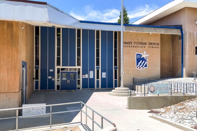 A tall blue entrance welcomes you to Mary P. Henck Intermediate School of Lake Arrowhead.