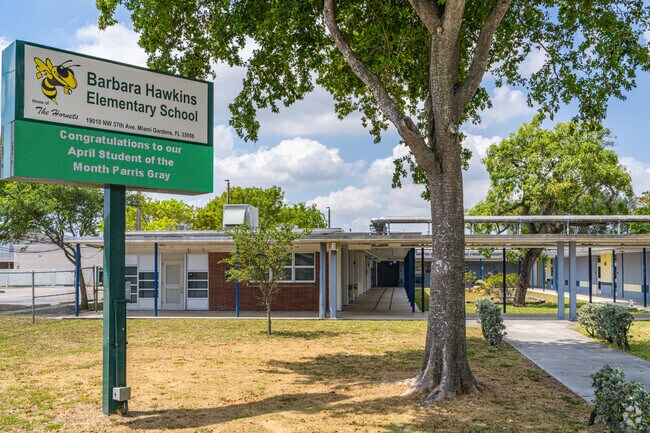 Clear signage guides visitors through Barbara Hawkins Elementary School's campus.