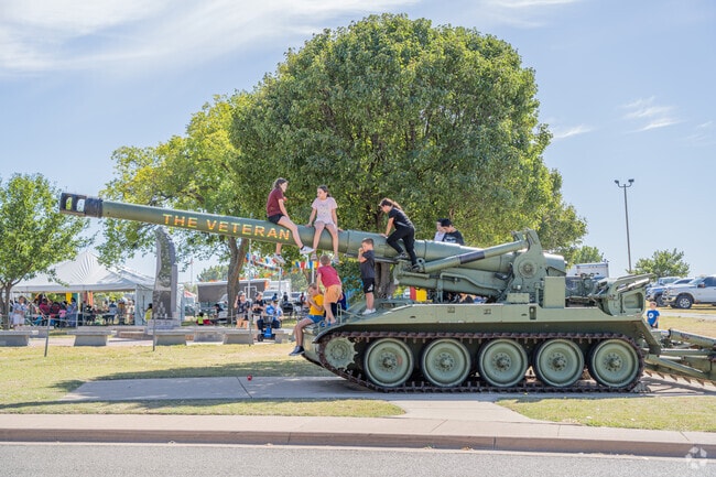 The antique tank is a favorite spot for kids at Elmer Thomas Park.