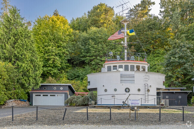 The historic bridge to a WWII tugboat became a private residence in Hansville.