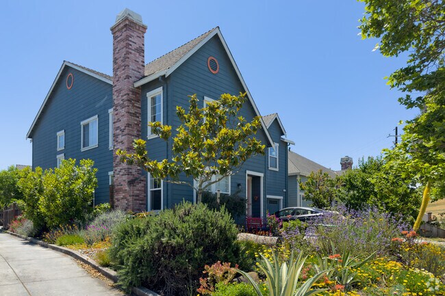 You can find large homes with a stone chimney in San Juan Bautista, California.