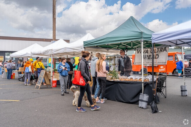 People come to the Fairwood Farmers market to see local bakers and other shops.