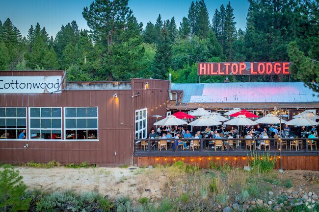 Cottonwood at Hilltop Lodge offers outdoor dining with sweeping Sierra views.