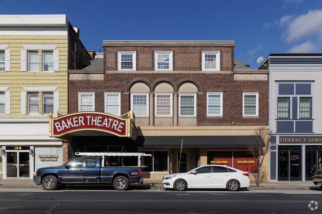 Opened in 1906, the Baker Theatre joins other century-old buildings in downtown Dover that house Peruvian, Colombian and Guatemalan restaurants.