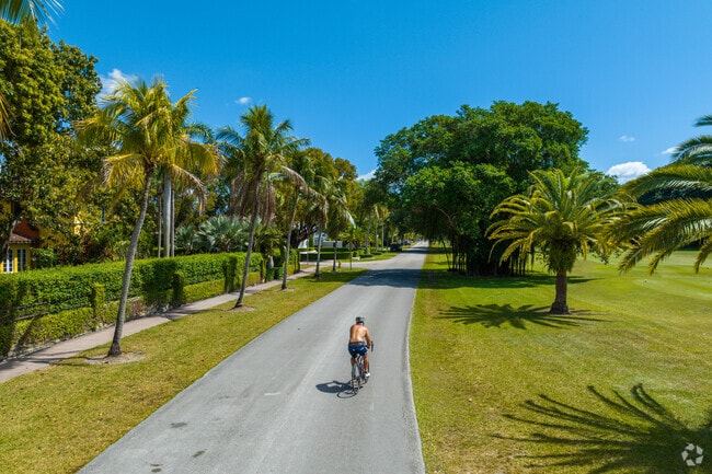 The picturesque surroundings of the Coral Gables neighborhood make it a great place to bike.