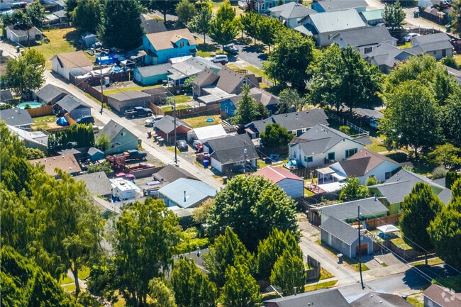 Aerial view of Saint Helens neighborhood showcasing its charming residential homes and greenery.