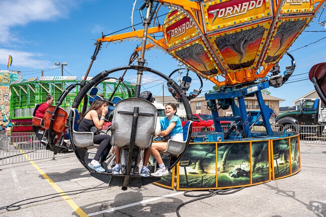 Take a spin on a carnival ride at the Bucktown Seafood Festival.