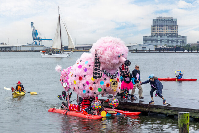 Baltimore Kinetic Sculpture Race star of the show Fifi hits the water in pretty in pink fashion