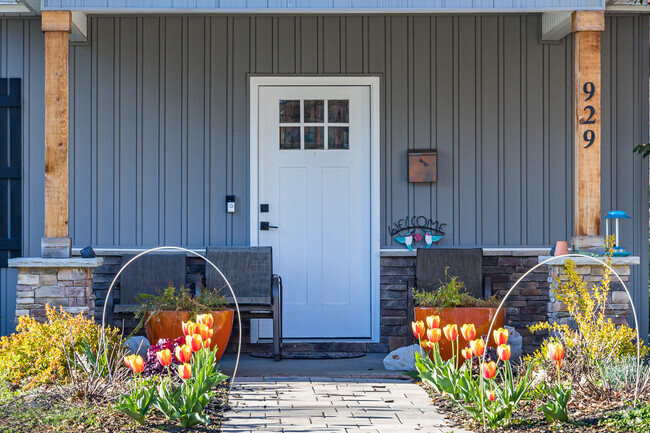 A renovated West Salem home displays vibrant spring flowers.