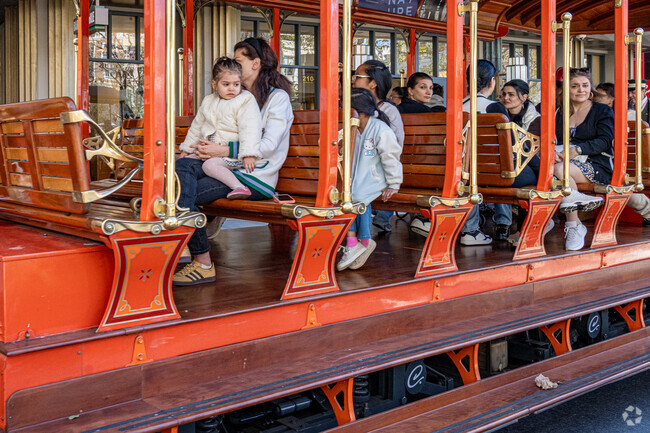 Tropico locals and visitors ride the trolley at Glendale's The Americana at Brand.