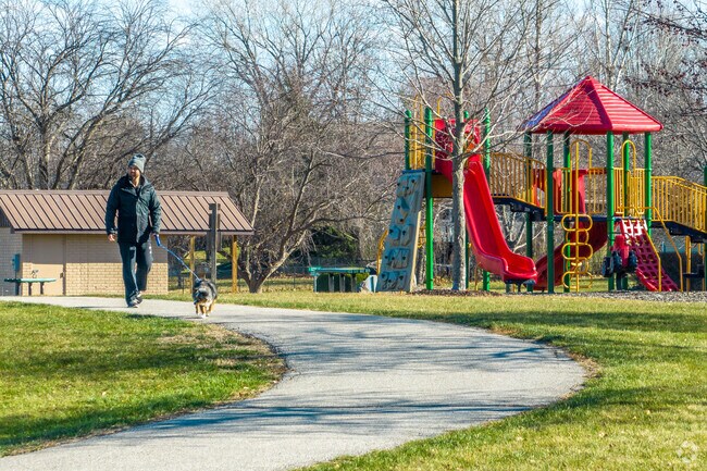 Adel’s Evans Park features winding trails popular with walkers and nature lovers.