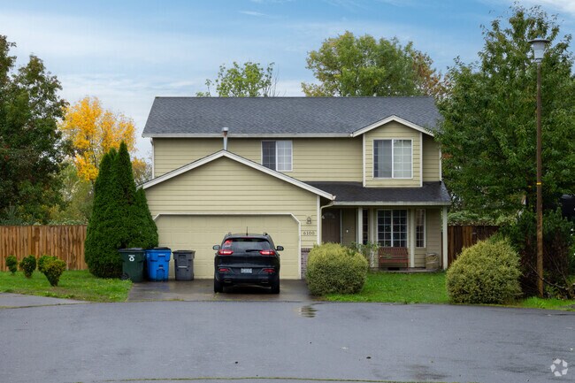 A quiet cul‑de‑sac adds privacy in Fisher’s Village‑Orchards.