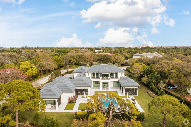 Estate and courtyard homes have sold for $4.1 million-$5.7 million in Ritz Carlton.