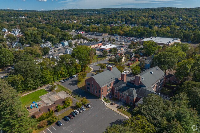 Hop Brook Elementary School playground neighbors the parking lot in Naugatuck, CT.