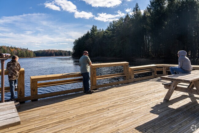 A family enjoys a day of fishing from the pier at Black Moshannon State Park north of Union.