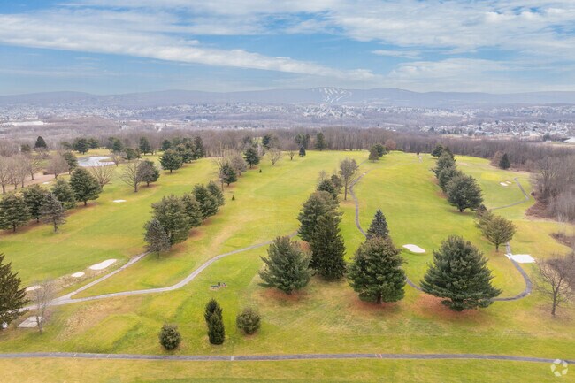 Golf at Pine HIlls Country Club with spectacular views of Montage Mountain and later, go skiing.