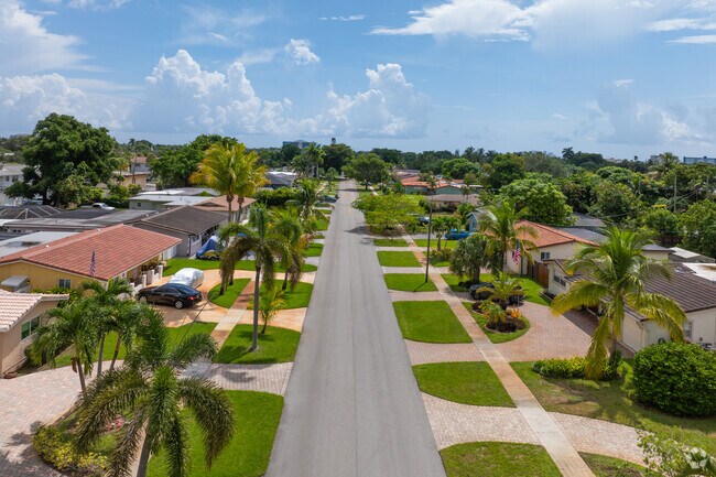 Stroll through Lawn Acres, a picturesque neighborhood with classic suburban charm.