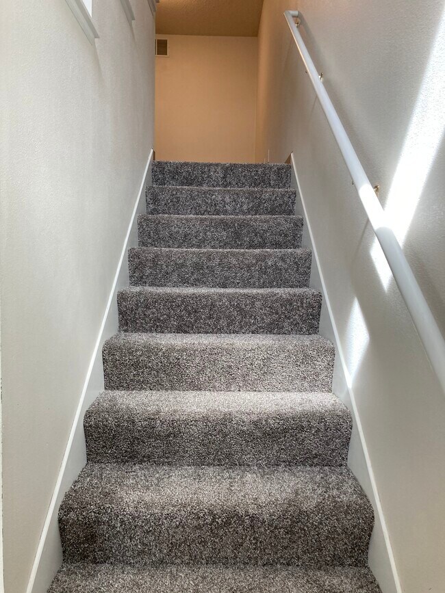 Stairs to den and bedrooms