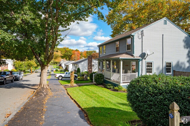 Most homes in Saugus have grassy lawns and might be covered by large trees.